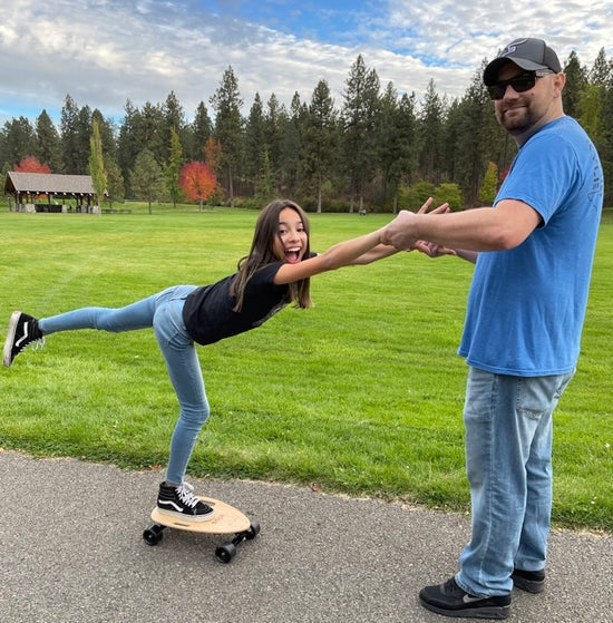 Father and daughter enjoying Elos skateboards as a fun family activity